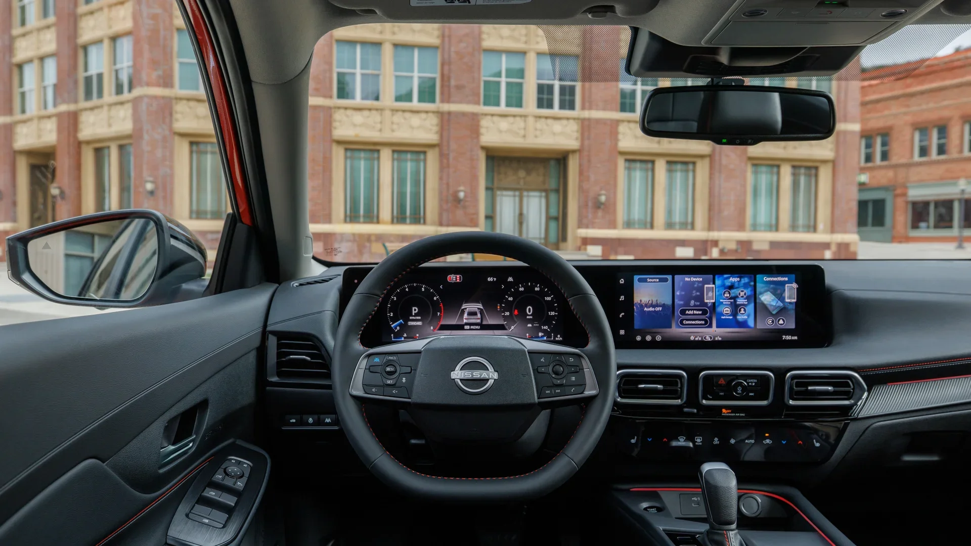 2025 Nissan Sentra® cockpit with digital gauge steering wheel and wide infotainment display in view.