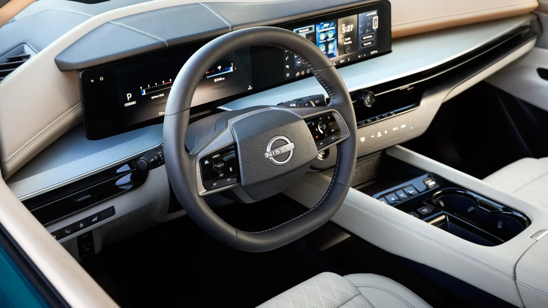 2026 Nissan Murano® center console with push-button shifter, drive mode control and dual cupholders.